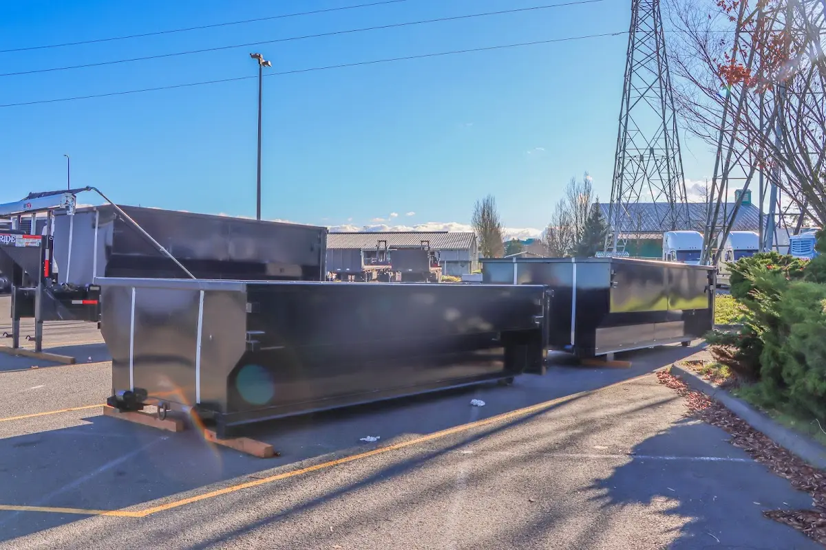 Roll-off dumpster ready for waste disposal at job site for 2 Yard Dumpster Rental in Honey Brook